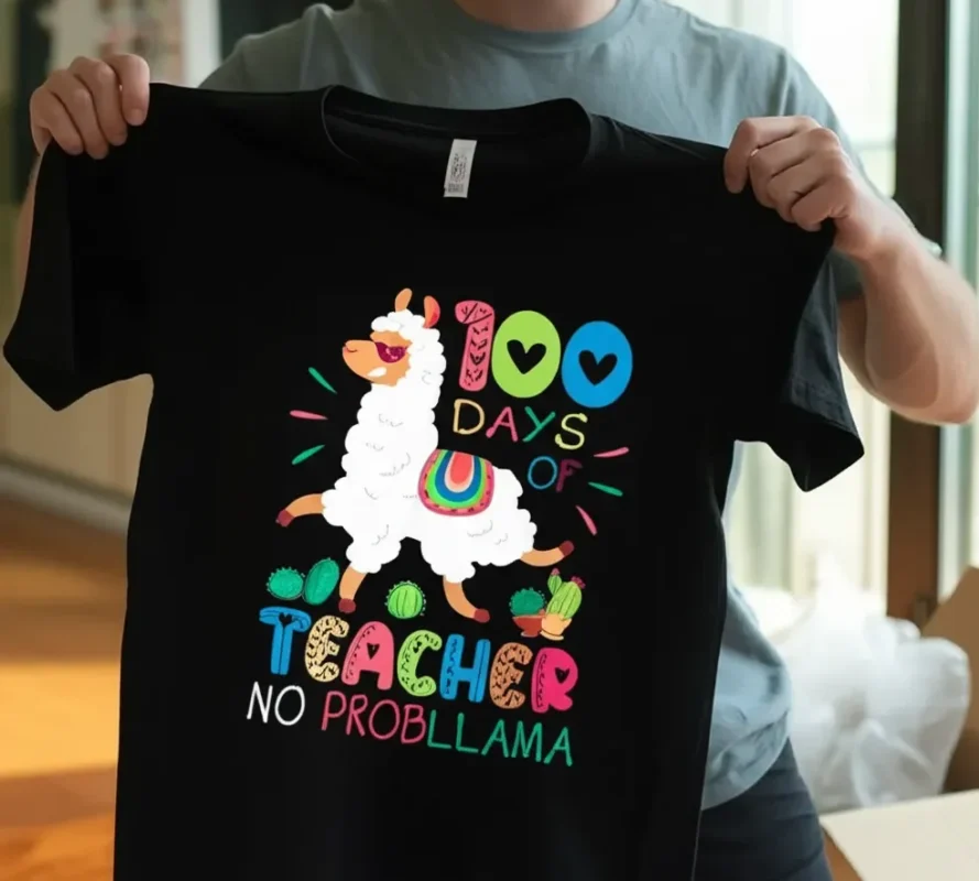 a person holding up this shirt freshly delivered by the shoulders, arms extended in front of them as if inspecting the design.